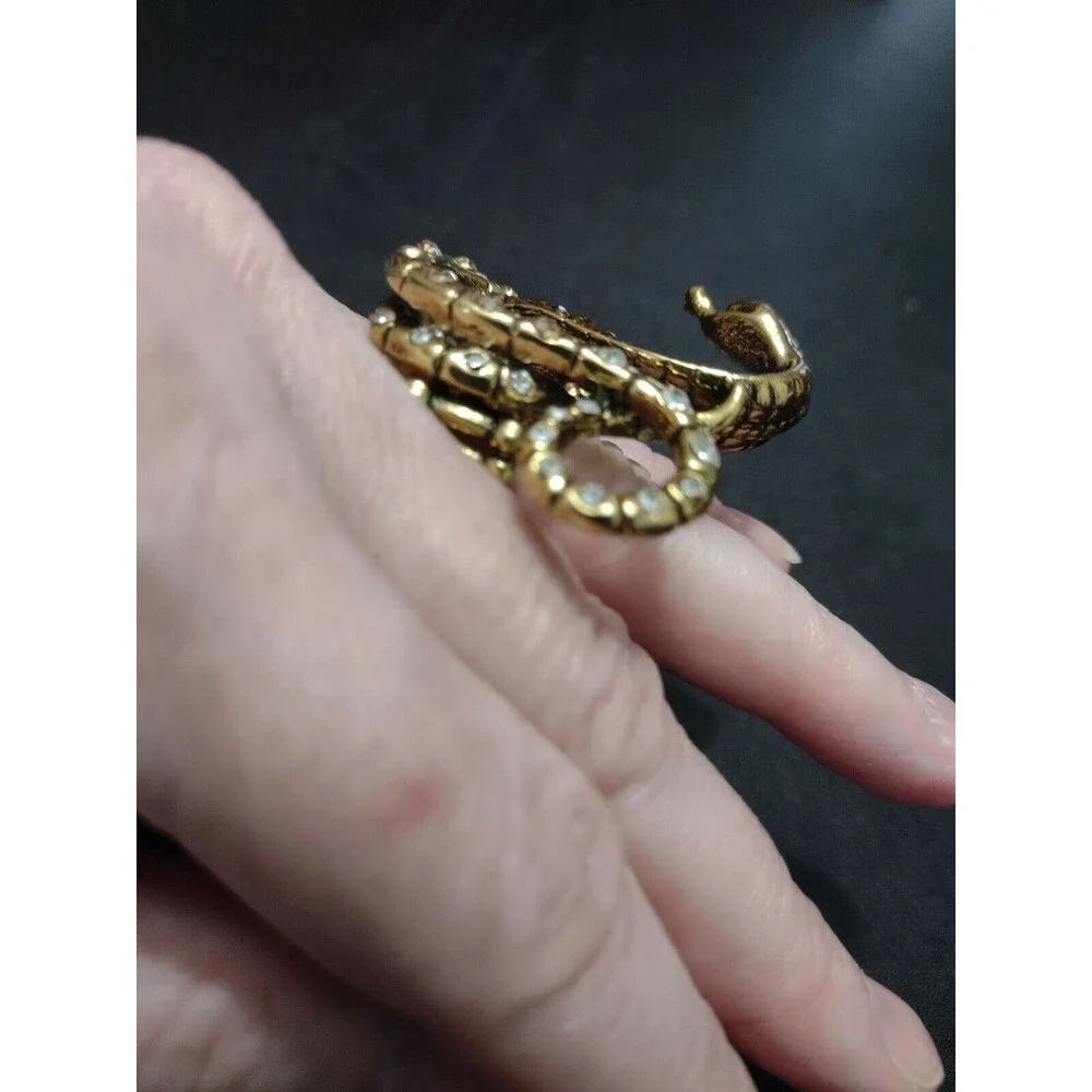 Gold tone rhinestone snake ring